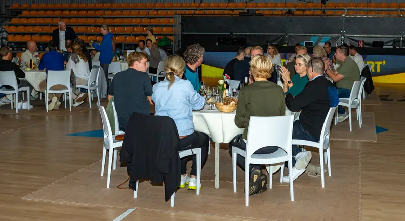 Guests at the table during a business event in the arena