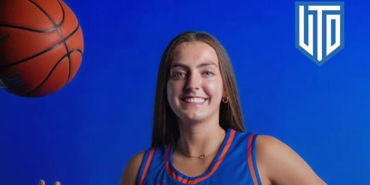 Natalie Pasco met een basketbal in het tenue van Boise State University