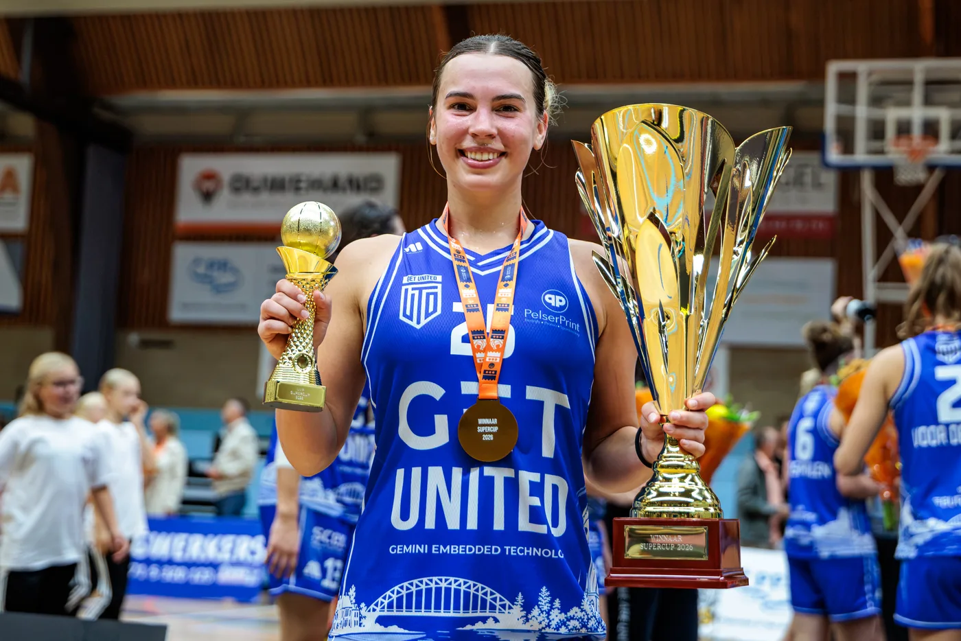 Kaylee Borden with the MVP trophy and the Supercup after her debut for GET United